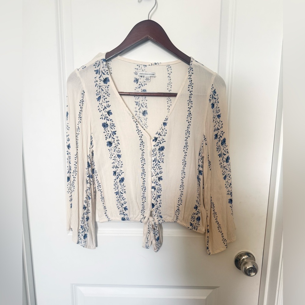 American Eagle Cream Blouse with Blue Floral Stripe Tie-Front